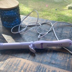 Beachwaver B1.25 Curling Iron in Purple used a couple of times.
